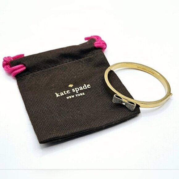 Kate Spade New York Gold-Tone Bow Bangle Bracelet with Crystals + Pouch - Picture 2 of 10
